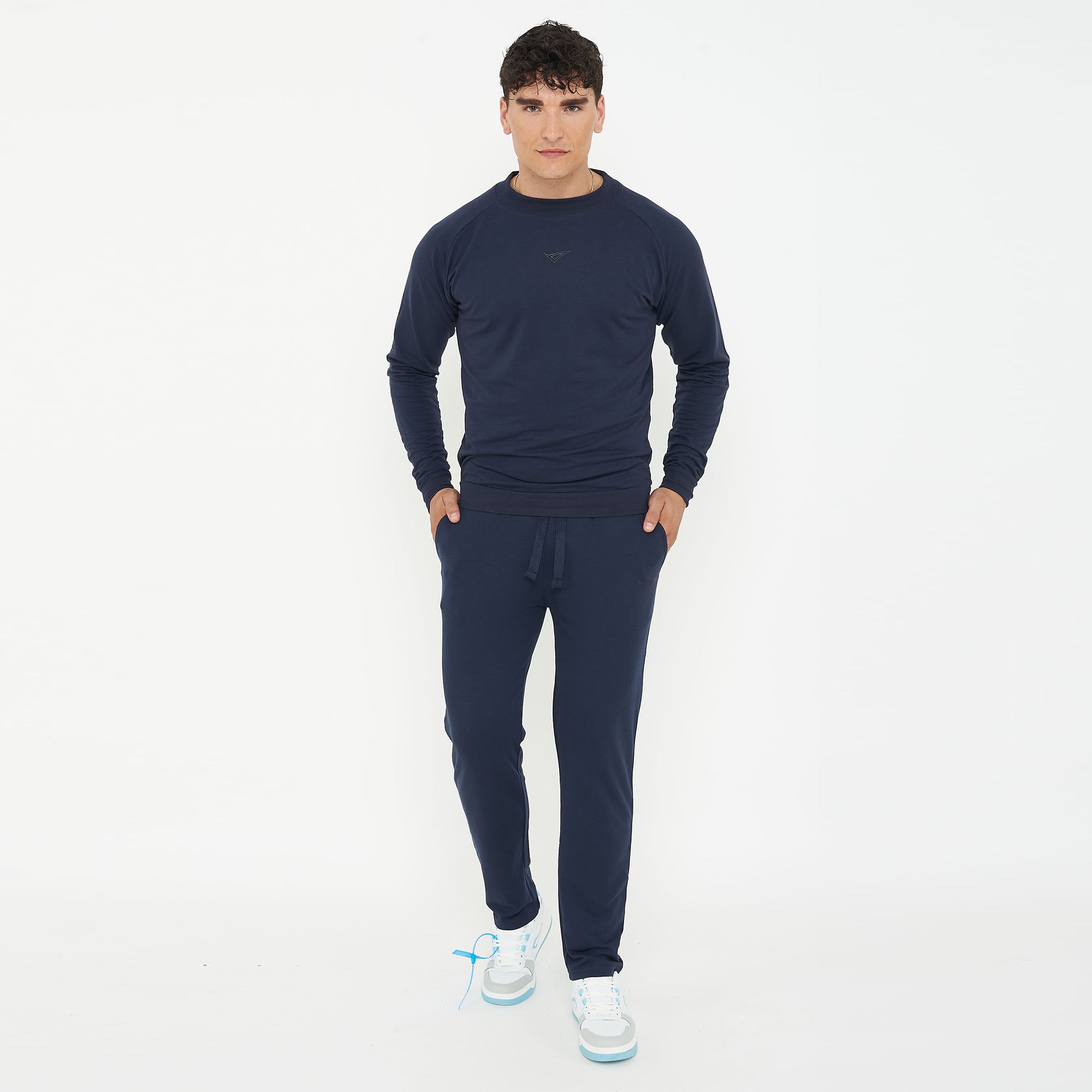 Pantaloni running slim fit con zip alla caviglia